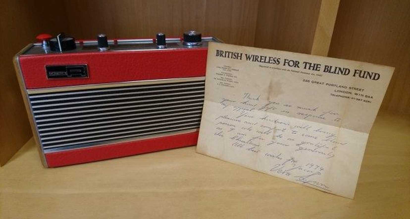 Letter from vera Lynn rests against an old red radio