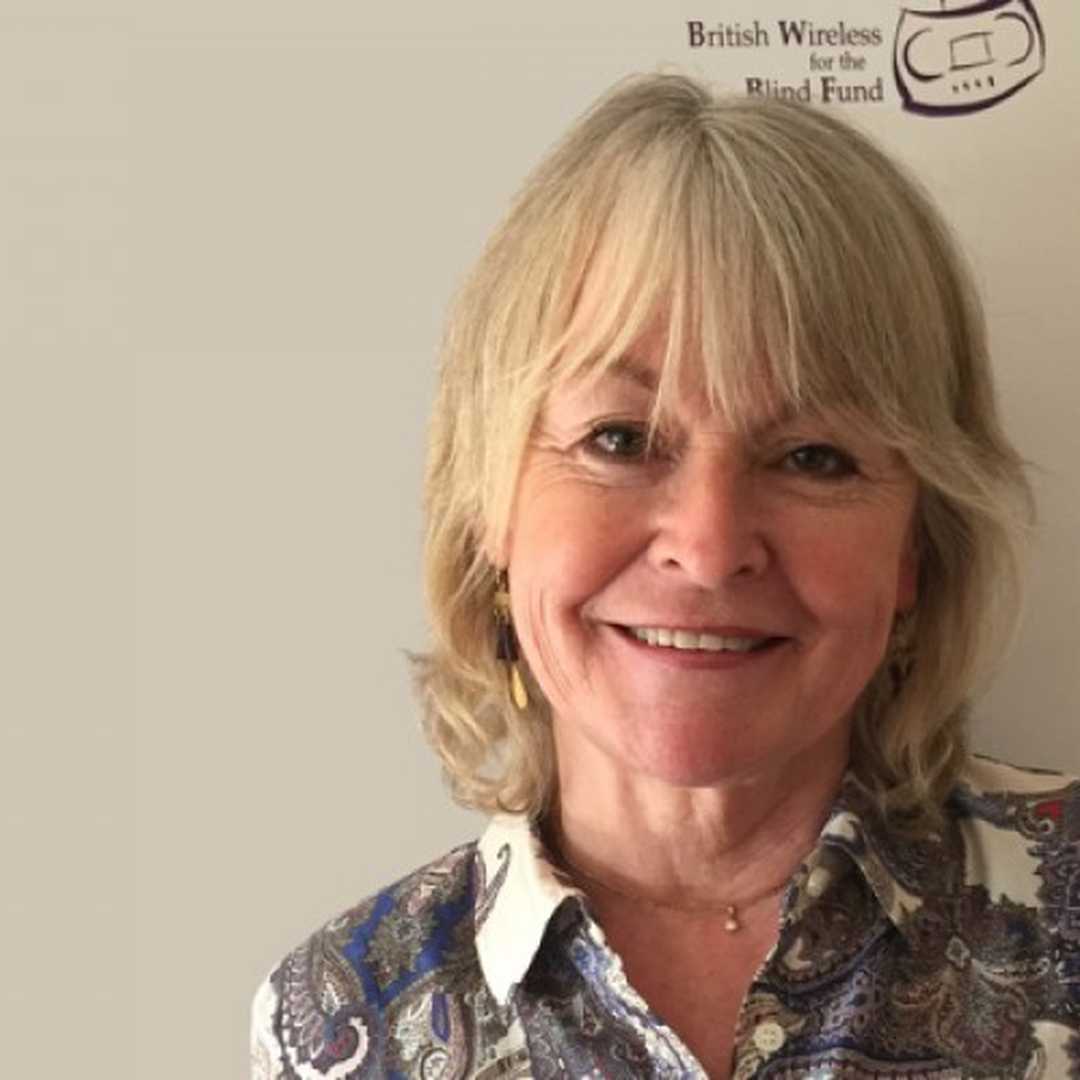 BWBF Patron Sue Cook is smiling to camera. She has blonde hair and is wearing a patterned shirt.