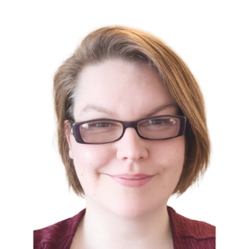 Sam, Volunteer and Projects Coordinator, smiling at the camera. She has short light brown hair, wears glasses and a red top, against a plain light background.