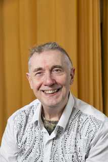 Paul Quigley, musician and performer. Paul lives with sight loss and is a beneficiary of BWBF.