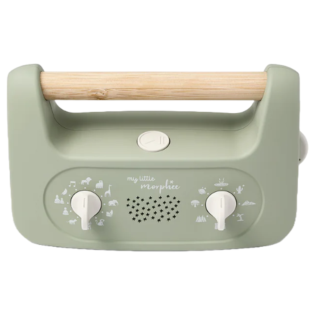 The My Little Morphee sleep soother device. The device has a wooden handle and two white dials with different symbols around them.,